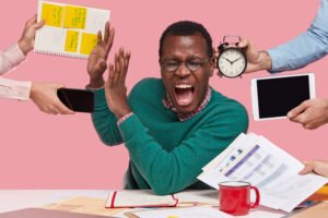indoor shot desperate young afro american man screams desperately makes stop gesture dressed green sweater busy working isolated pink background people