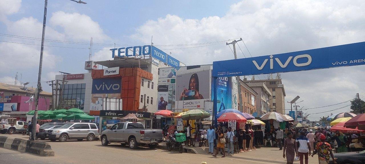 Android dominance in Nigeria as a Nigerian user holds an Android smartphone