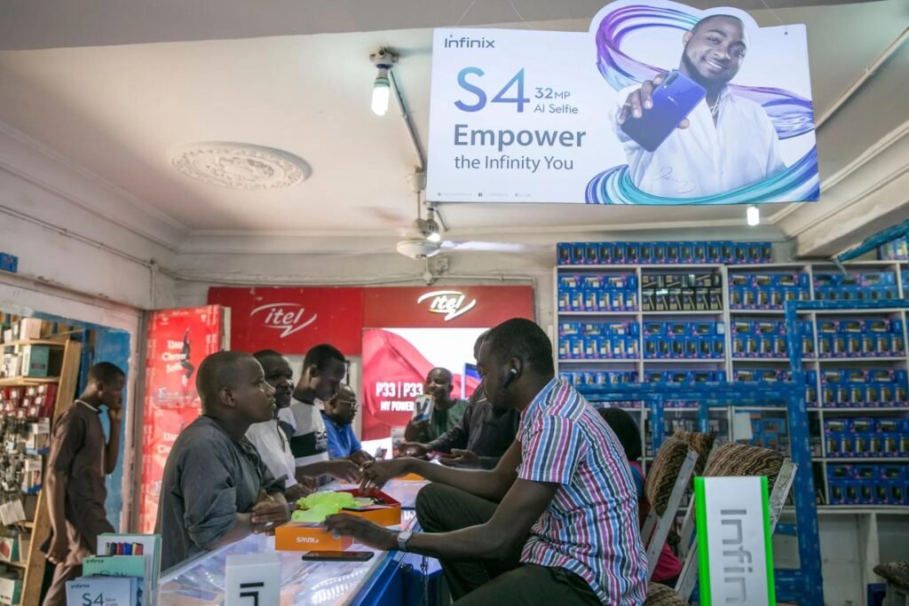 Android dominance in Nigeria as a Nigerian user holds an Android smartphone
